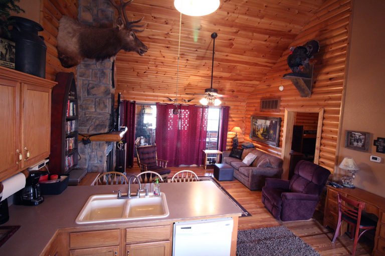 View From the Kitchen to Living Room Old West Log Cabin