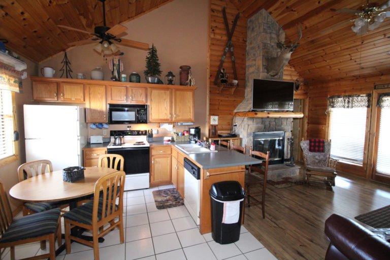 Kitchen and Fireplace Trails End Log Cabin