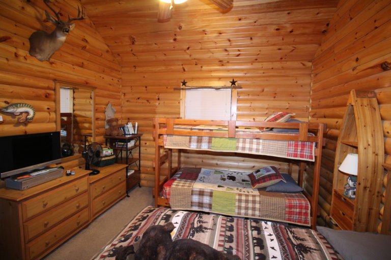 Guest Bedroom With Queen Size Bed and Bunk Beds View #2 Trappers Den Log Cabin