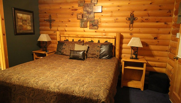 Master Bedroom with King Size Bed Split Oak Log Cabin